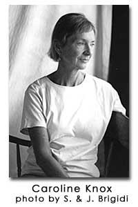 a black and white 3/4 view of Knox in a light colored shirt