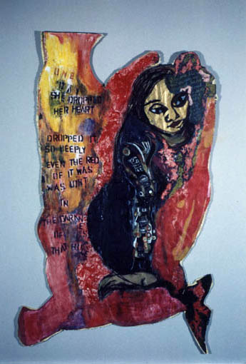 mixed media art object with text and a female figure